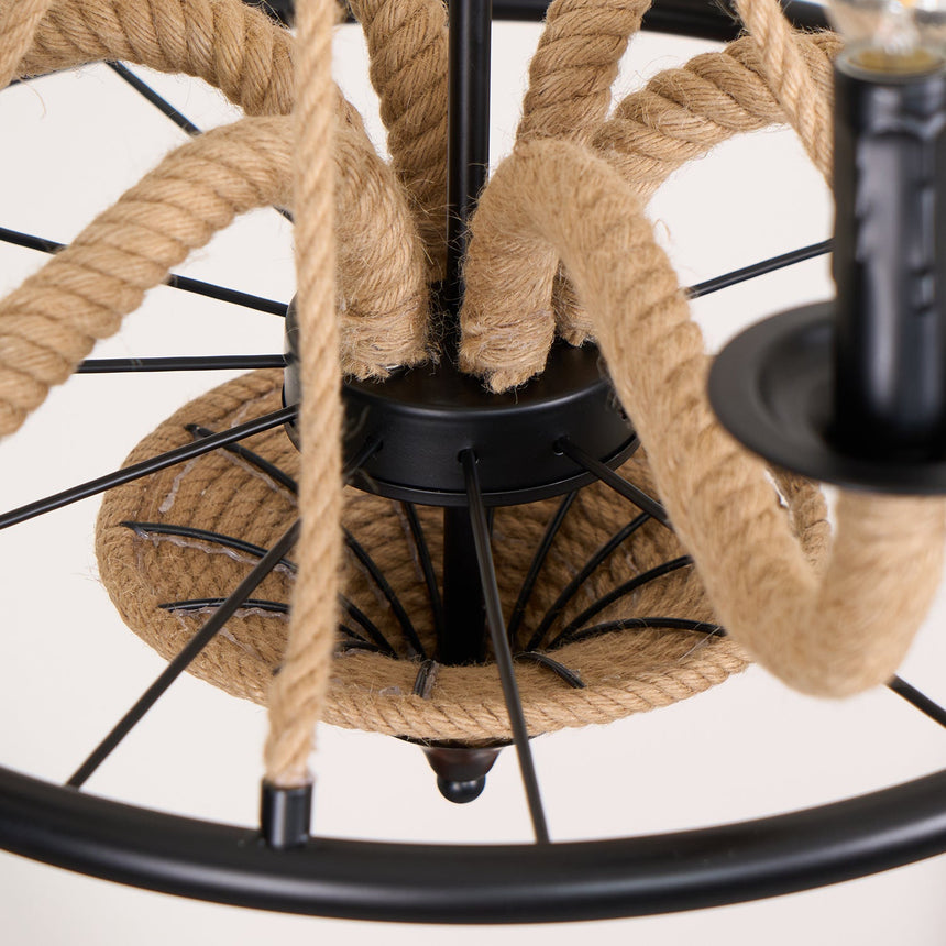 Hemp rope bound over the iron spokes at the base of the fitting