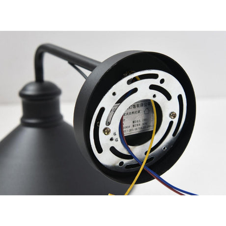 The back of the wall plate showing the mounting bracket and the wiring leads