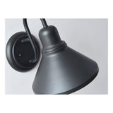 Close view of the matte black cone shade and the curve of the arm