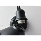 Close view of the socket inside the cone, where the E26 bulb screws in