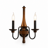 The turned wood candlestick carrying two iron candle arms and two lamps