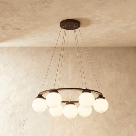 The widest ring with globes massed around it, hung on four fine cables