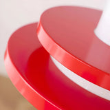 Close view of the red disc edges and the white diffuser
