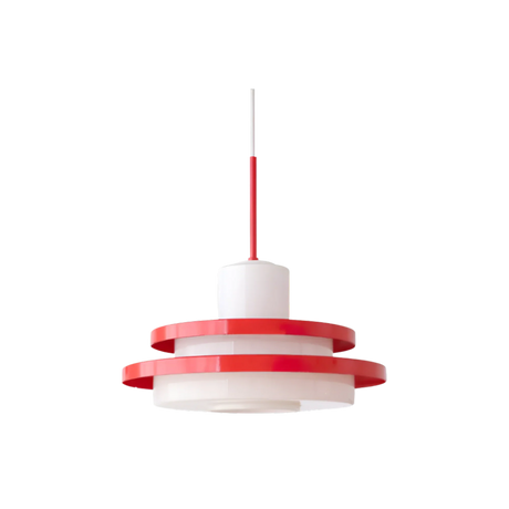 Red disc pendant photographed straight on against white
