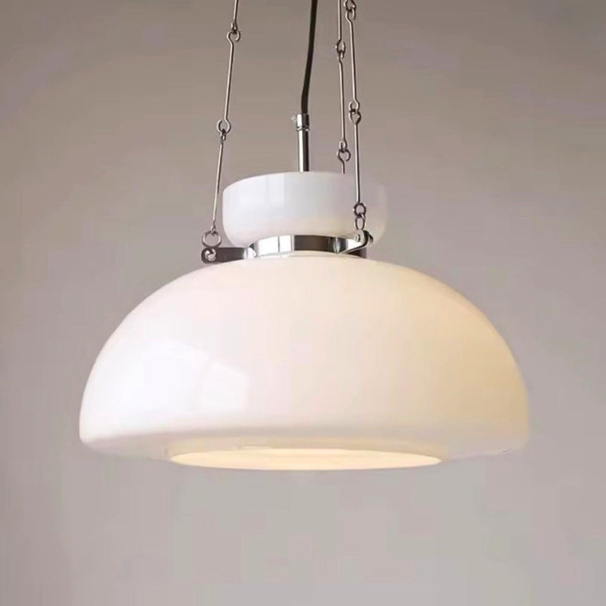 Close view of the cream glass dome and its white metal cap
