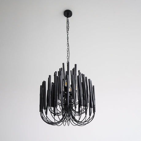 The black version of the rod chandelier seen against a plain ground