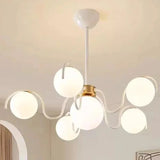 The cream version lit on a white ceiling in a bright pale room