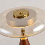 The lit underside of the amber glass ring seen close