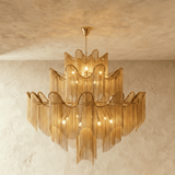 The largest gold version, five tiers of wavy bands over long curtains of chain
