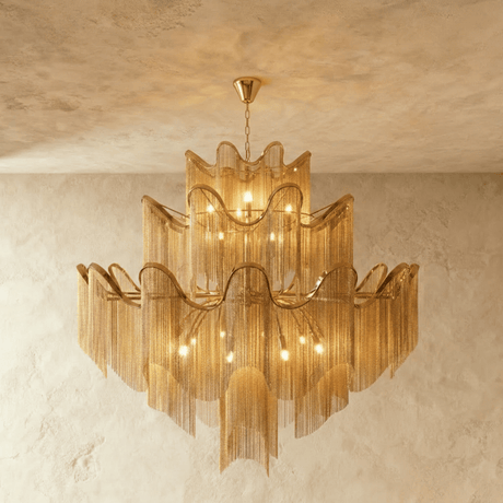The largest gold version, five tiers of wavy bands over long curtains of chain