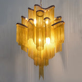 The gold bands lit from within, the chain curtains catching the light below
