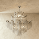 The largest silver version, five tiers of bands over long curtains of chain