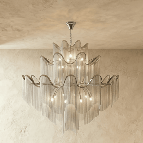 The largest silver version, five tiers of bands over long curtains of chain