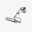 Polished tube on a double jointed arm rising from a square wall plate