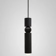 The black single pendant shown against a pale background