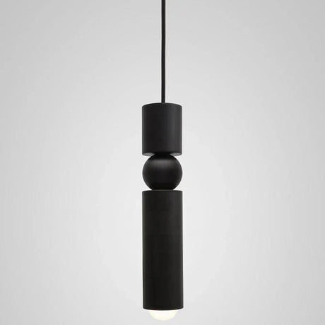 The black single pendant shown against a pale background
