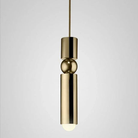 The gold single pendant shown against a pale background