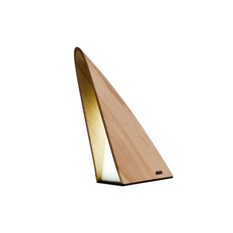 Small bedside lamp in natural wood seen from the front, plain ground