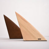 Two small bedside lamps unlit showing both wood finishes