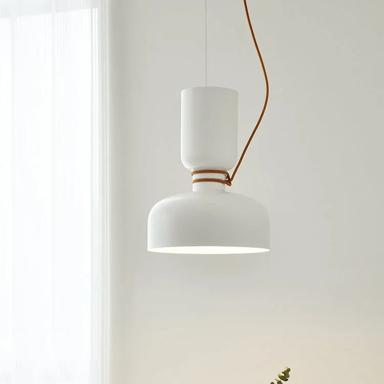 Cream pendant hung in front of a bright window