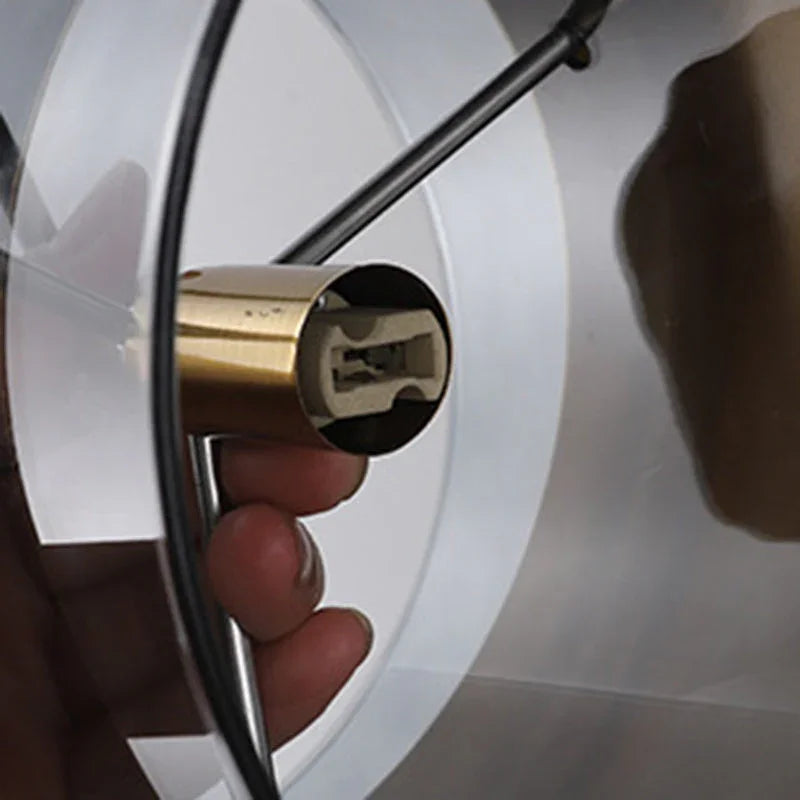 A hand beside the brass band showing how wide the fitting is