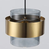 Close view of the brass band wrapped around a smoke gray glass cylinder