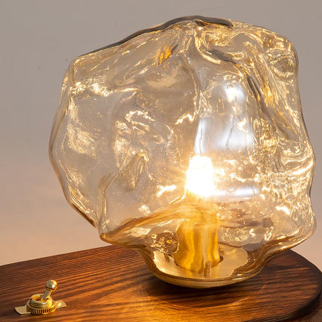 Close view of the facets in the amber glass with the bulb inside