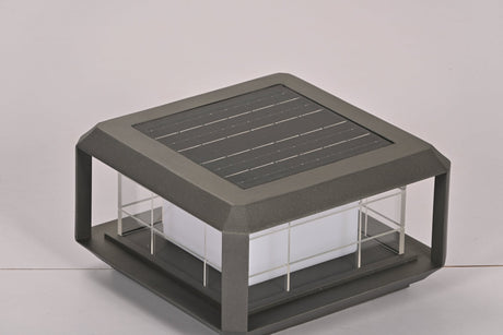 The solar panel set into the flat top face of the lantern body