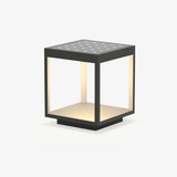 Open frame solar post light with a textured panel set across the lid