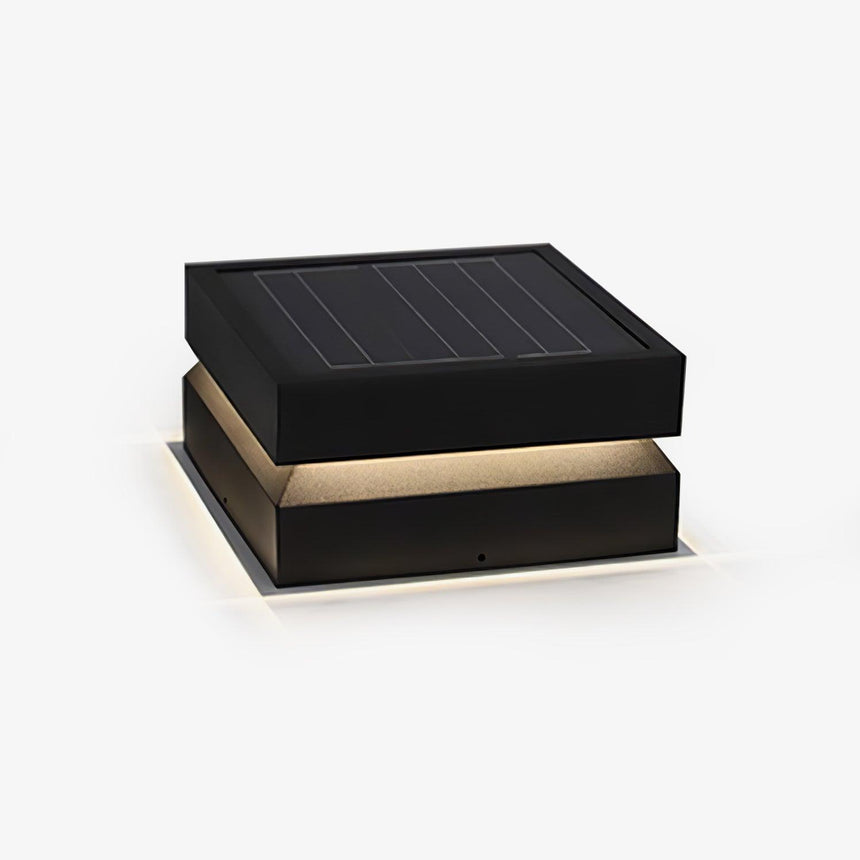 Low stacked slab post light with a solar panel across the upper face