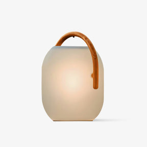 Rounded white lantern with a wood tone arched handle over the body