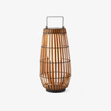 Rounded lantern in braided faux rattan with a slim metal carry handle
