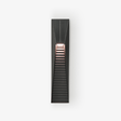 Slim black wedge step light with a louvered lower face on a pale wall