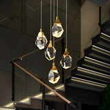 crystal chandelier installed in staircase setting