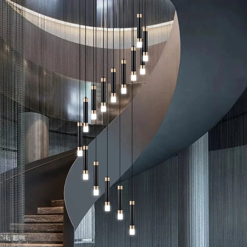 The spiral following a curved white staircase up through a tall stairwell