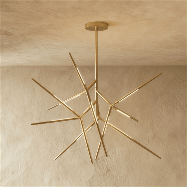 A gold sputnik chandelier whose lit arms radiate in every direction from one hub