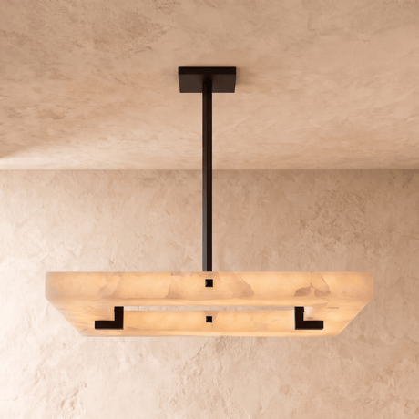The same square panel unlit, pale stone with a black frame set inside it