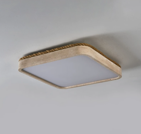 Underside of the square travertine ceiling light showing the full light panel