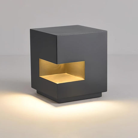 The cube seen at an angle, the recessed slot and the flat lid visible