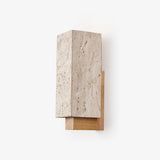 Square wall sconce, a travertine block standing on a wood shelf bracket