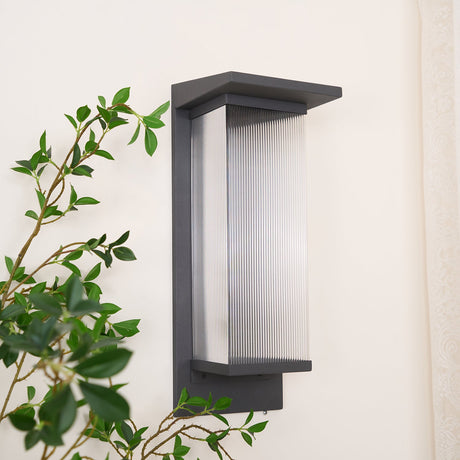 Side view of the unlit lantern, showing the depth of the box and the back plate