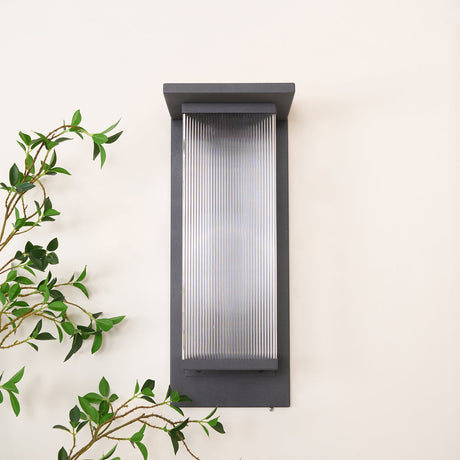 Front view of the unlit lantern, the clear ribbed panel in the black frame