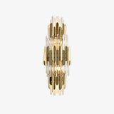 Tall wall sconce with three tiers of gold stainless steel blades and clear crystal prisms