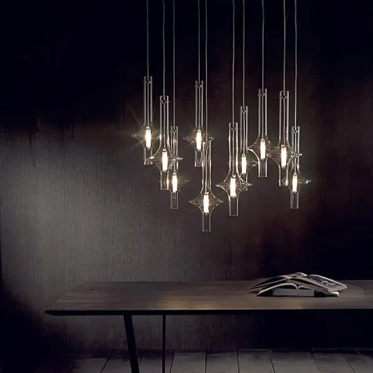 A long row of spindles above a dark dining table in a dim room