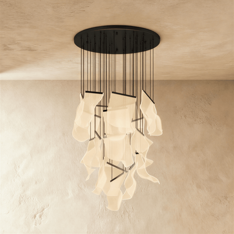 The same long cascade of lit sheets hung from a round black ceiling canopy