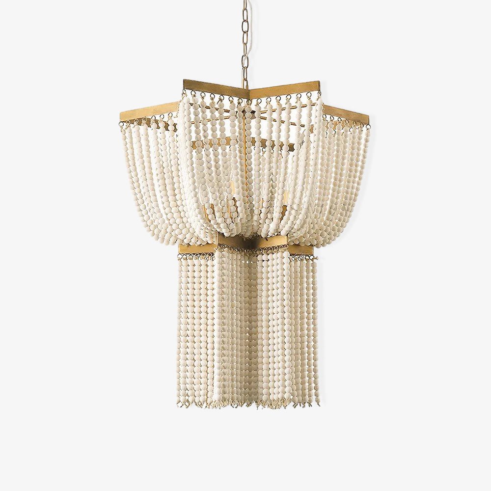A brass star shaped plate above two tiers of pale wooden bead strands