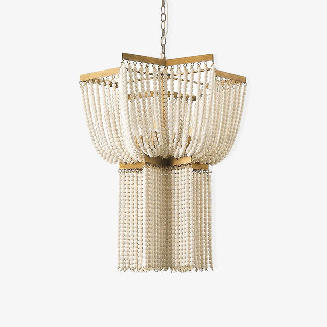 A brass star shaped plate above two tiers of pale wooden bead strands