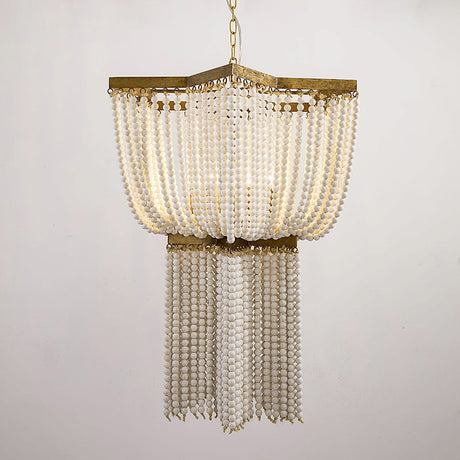 The wide upper tier of bead strands above the narrower lower tier