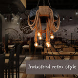 The tire lit above long tables in a room with a bicycle on the wall