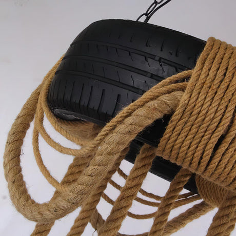 Rope wrapped over the tread of the tire with strands hanging free